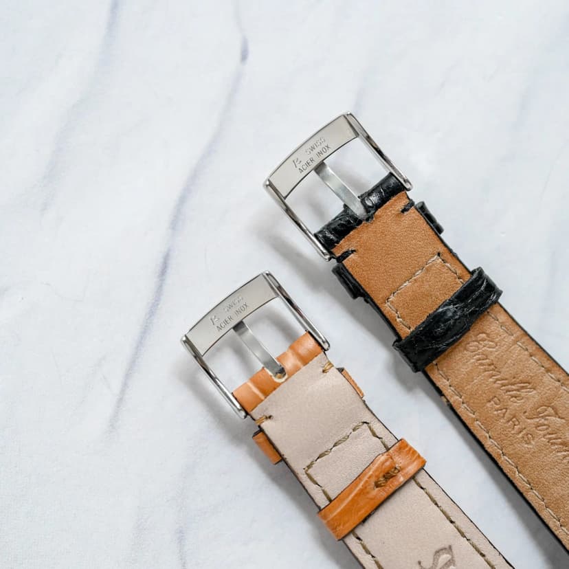 Shellman buckles, first generation (right), last generation (left)