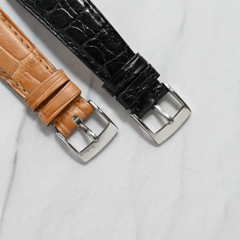 Shellman buckles, first generation (right), last generation (left)